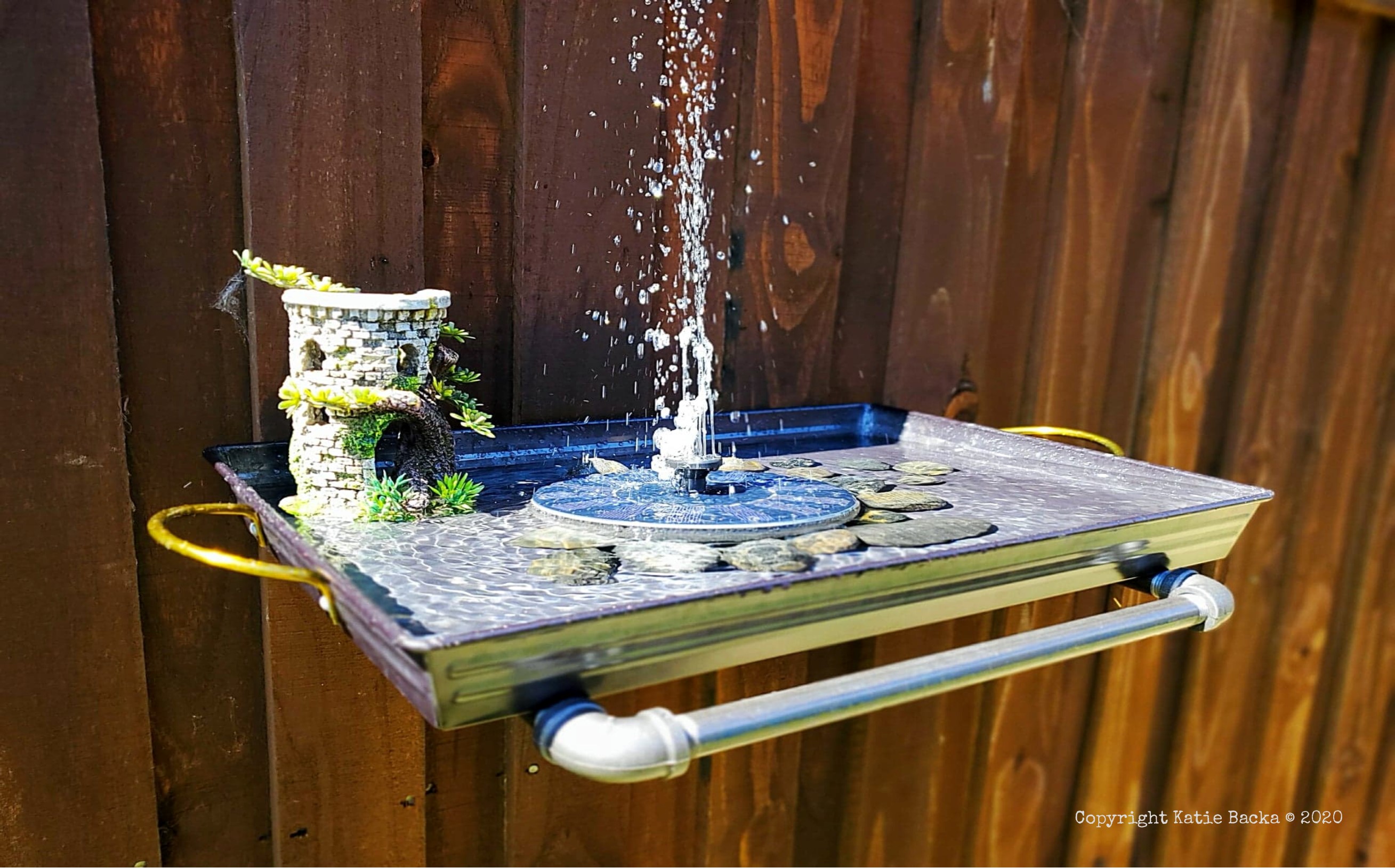 DIY bird bath with solar water fountain